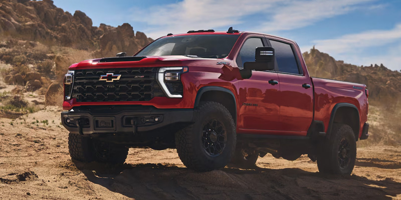 A 2025 Chevrolet Silverado HD Diesel in Radiant Red Tintcoat
